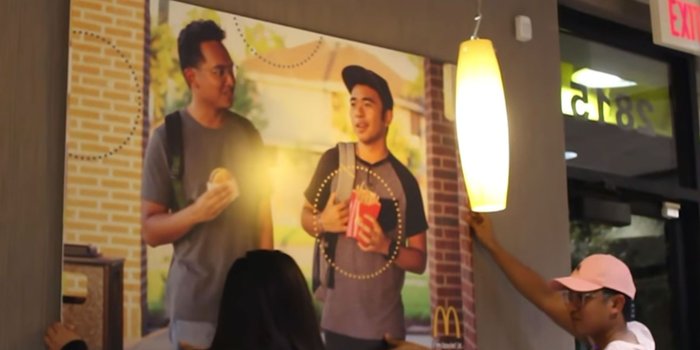 These Friends Snuck a Poster of Themselves Into Their Local McDonald’s — and It’s Still There